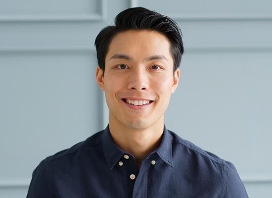 a man in Kingwood smiling after receiving dental bonding