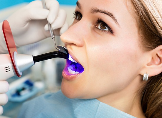 a patient undergoing dental bonding in Kingwood