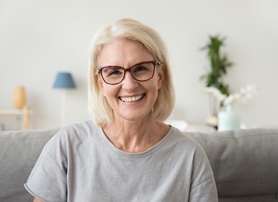 Older woman with dentures in Kingwood
