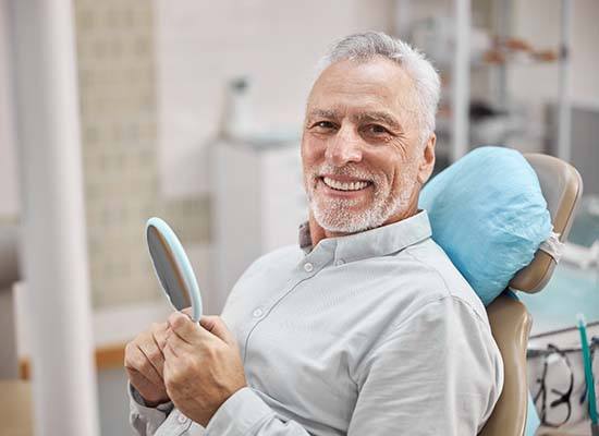 senior man sitting in the dental chair