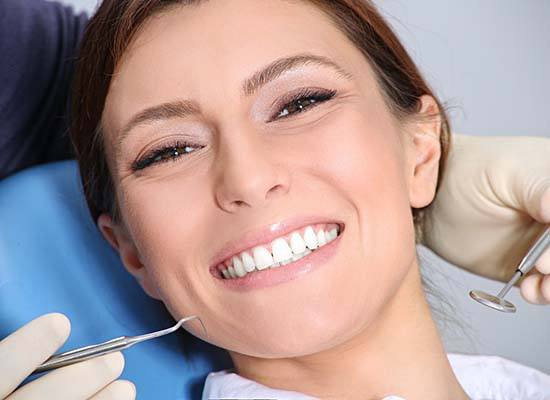 woman smiling at her dental checkup