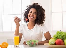 woman eating a salad