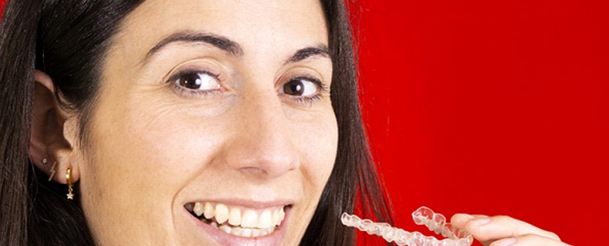 Woman smiling with Invisalign in Kingwood