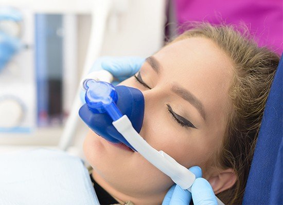 Patient with nitrous oxide nose mask