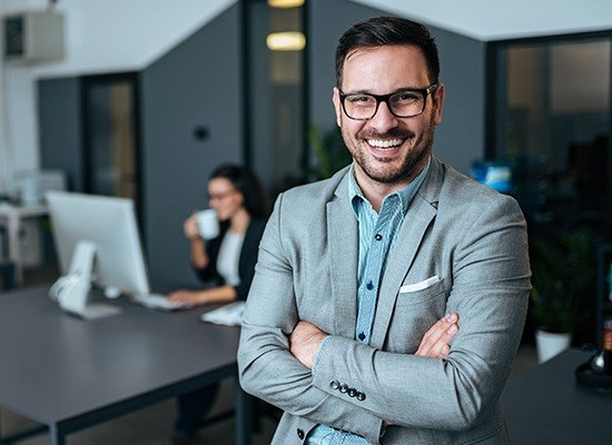 Man in business suit smiling