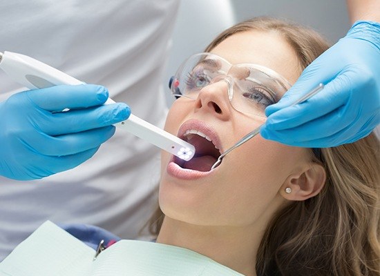 Dentist capturing intraoral images