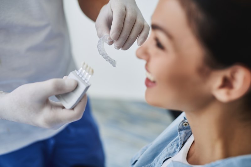 A dentist answering Invisalign questions