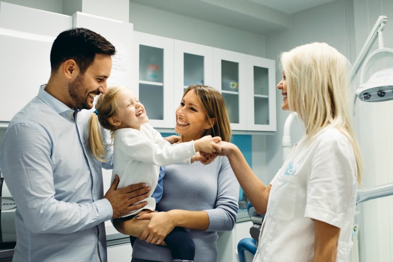 A family celebrating Children's Dental Health Month
